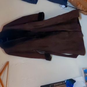 Long brown suede, leather lined wool winter coat.